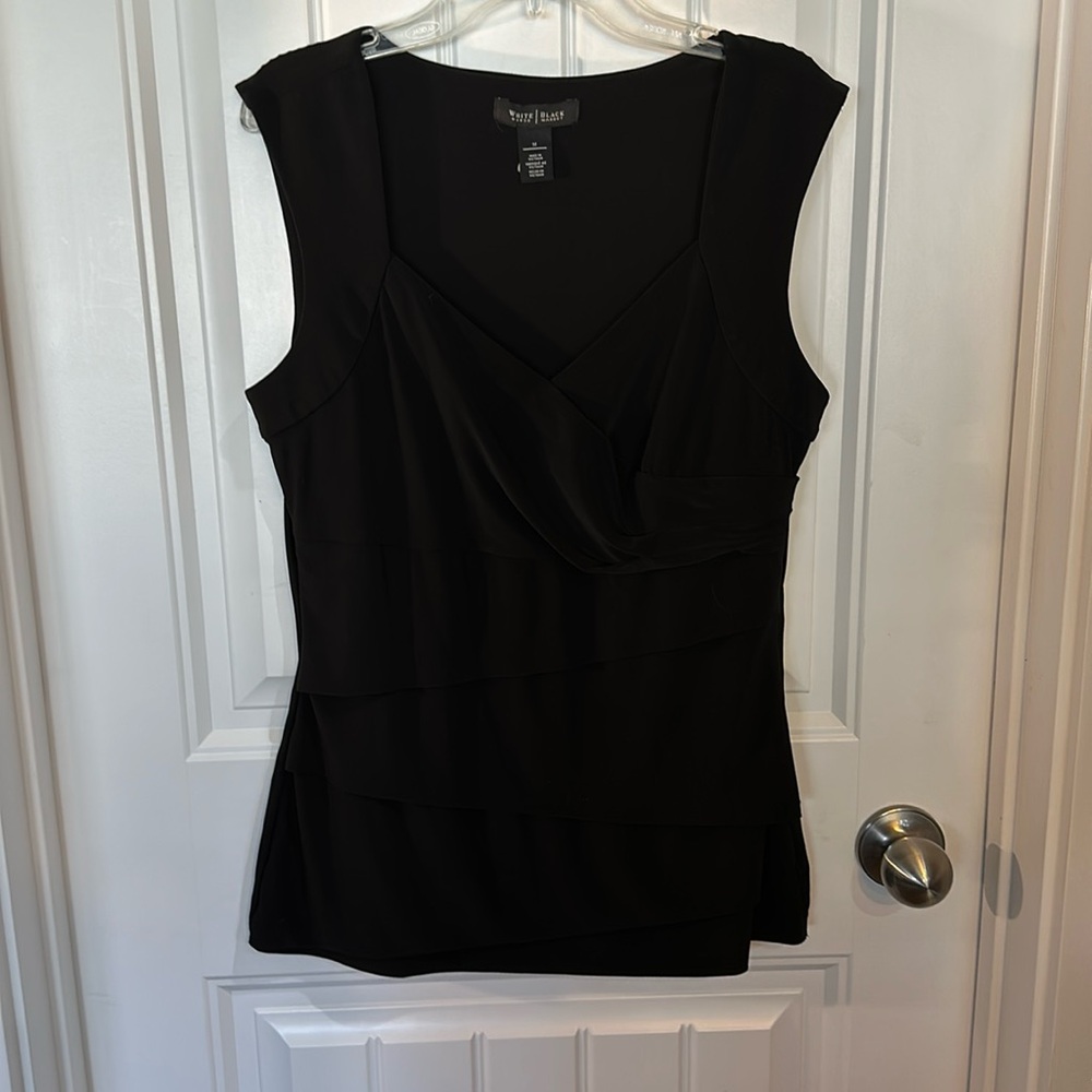 Pretty black silky feel sleeveless White House Black Market blouse. Great cond!